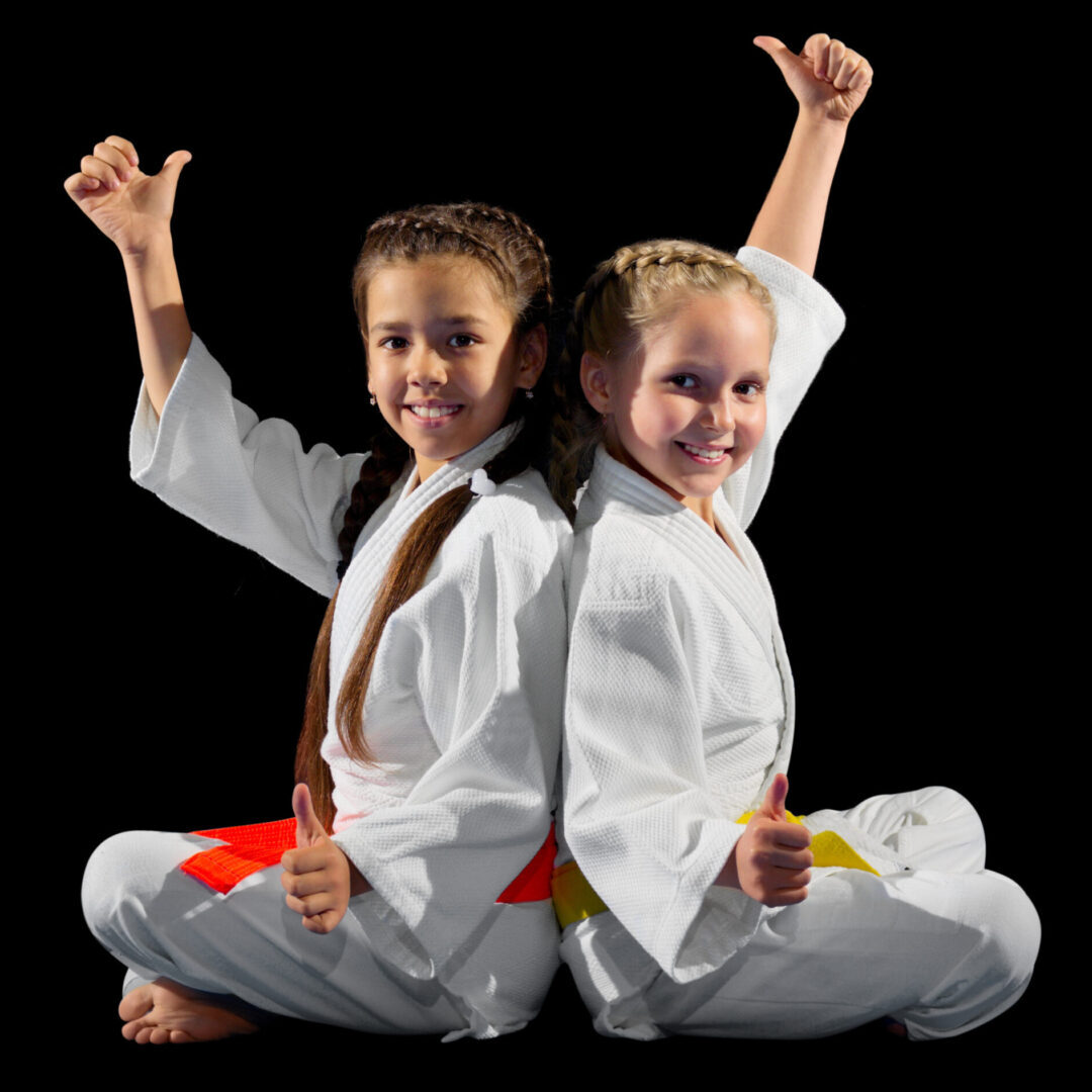 Little girls martial arts fighters isolated